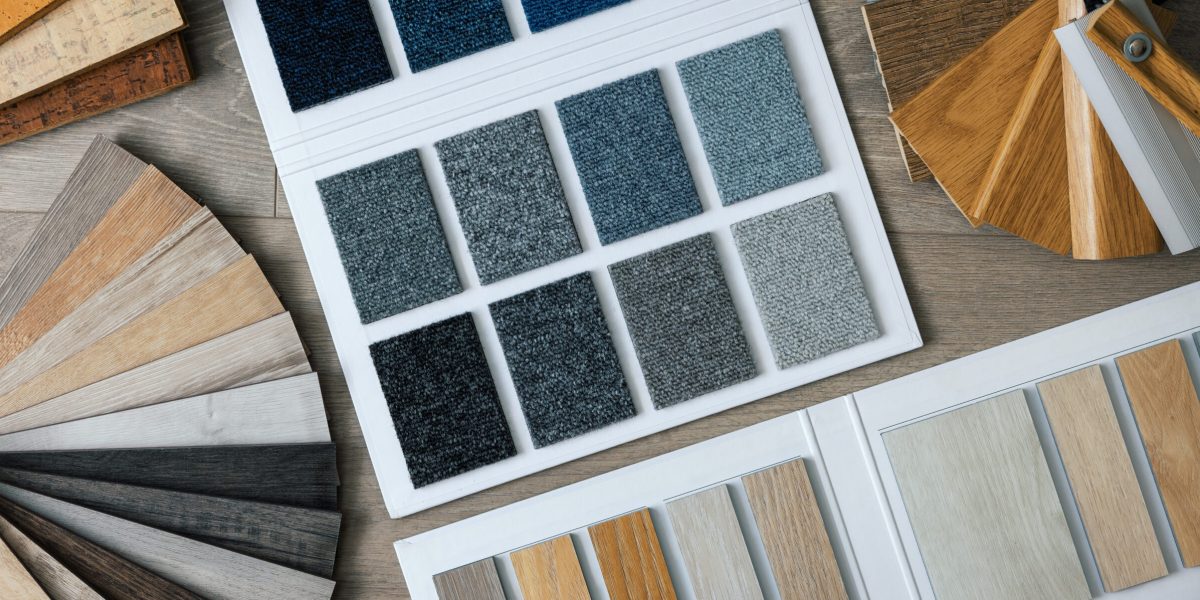 flooring material and skirting samples. carpet, laminate, vinyl. top view